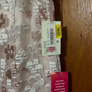 NWT.  Feather fun! Pink champagne cocktail dress.